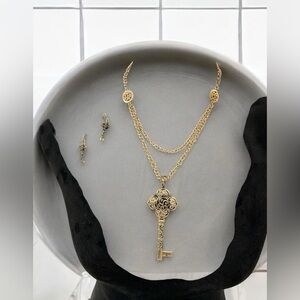 Super cute key necklace with matching earrings